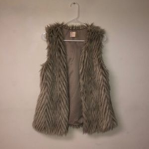 Grey and brown waist length fur vest